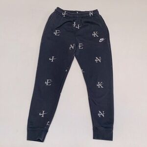 Nike sweatpants/ joggers with logo all over - in excellent condition